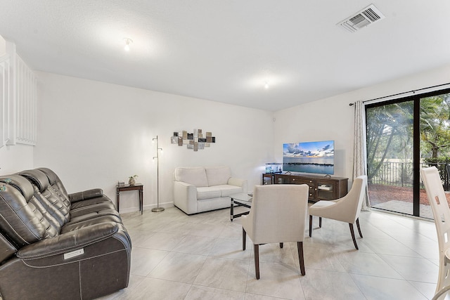 12968 Anthorne Ln, Boynton Beach, FL 33436 - living room featuring light tile patterned floors and visible vents