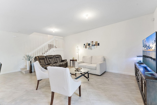 12968 Anthorne Ln, Boynton Beach, FL 33436 - living room with baseboards, light tile patterned floors, and stairway