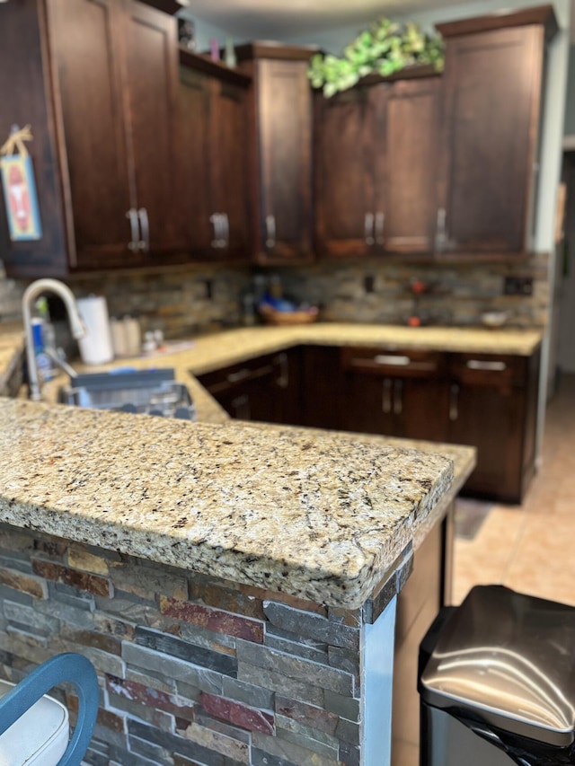 3237 El Camino Real, West Palm Beach, FL 33409 - kitchen with a sink and light stone countertops