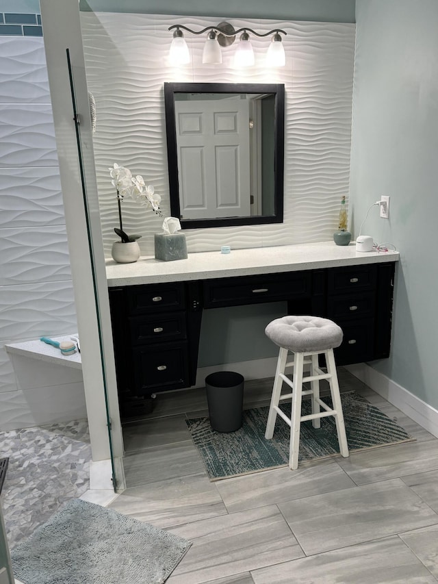 3237 El Camino Real, West Palm Beach, FL 33409 - bathroom with vanity and baseboards
