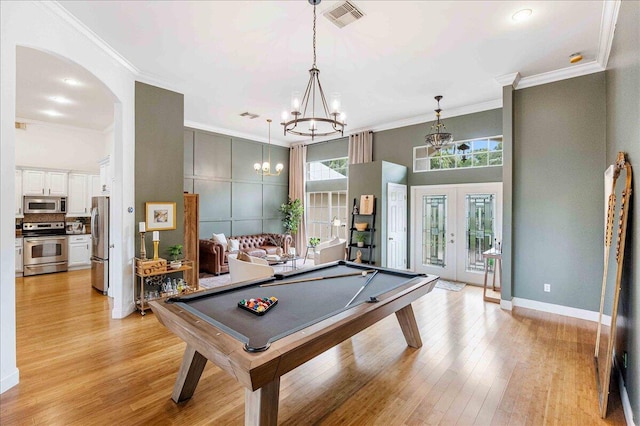 761 SW Lighthouse Dr, Palm City, FL 34990 - rec room featuring pool table, ornamental molding, wood finished floors, and a chandelier