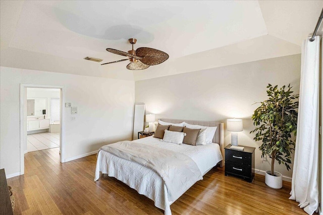 761 SW Lighthouse Dr, Palm City, FL 34990 - bedroom featuring baseboards, ceiling fan, wood finished floors, and visible vents