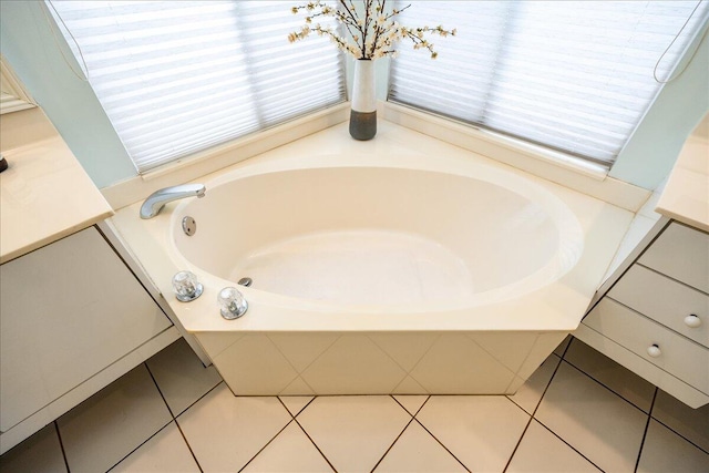 761 SW Lighthouse Dr, Palm City, FL 34990 - bathroom with a bath, a stall shower, vanity, tile patterned floors, and a notable chandelier