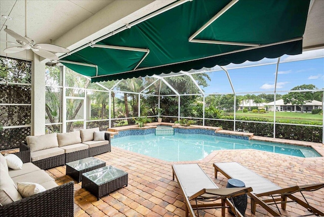 761 SW Lighthouse Dr, Palm City, FL 34990 - outdoor pool with glass enclosure, a patio area, and an outdoor hangout area