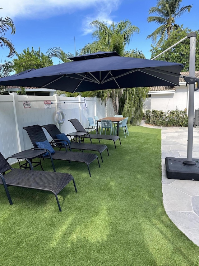 5111 NE 27th Ter NE, Lighthouse Point, FL 33064 - view of yard featuring central air condition unit and a patio
