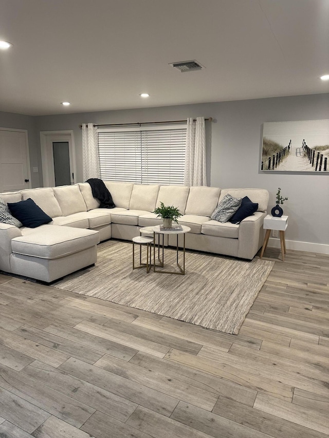 5111 NE 27th Ter NE, Lighthouse Point, FL 33064 - living room featuring recessed lighting, light wood-type flooring, and baseboards