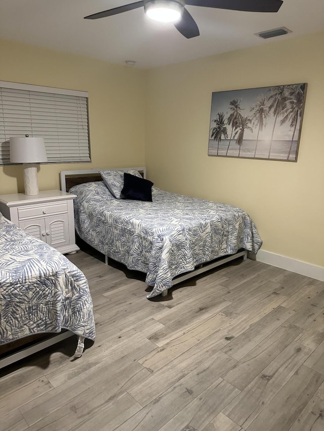 5111 NE 27th Ter NE, Lighthouse Point, FL 33064 - bedroom featuring light wood finished floors, ceiling fan, and baseboards
