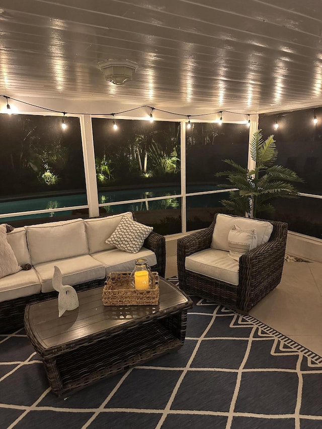 5111 NE 27th Ter NE, Lighthouse Point, FL 33064 - patio at night with an outdoor living space and a patio