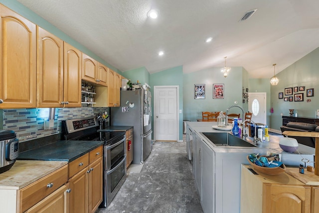 kitchen featuring appliances with stainless steel finishes, visible vents, decorative backsplash, and lofted ceiling