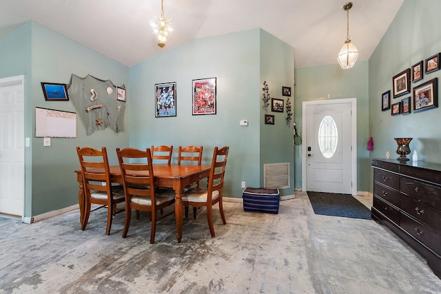 dining room with baseboards, vaulted ceiling, and visible vents