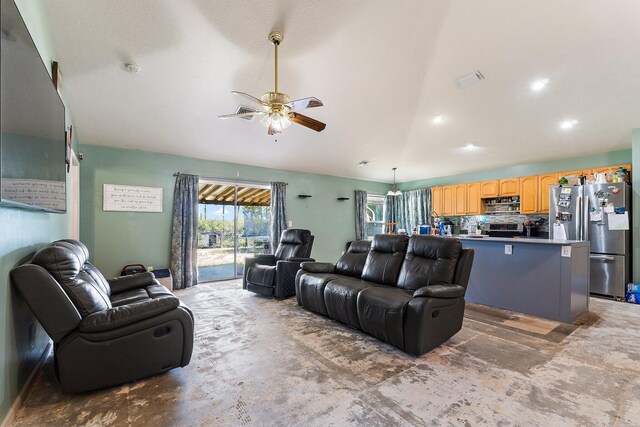 living area with recessed lighting, ceiling fan, and unfinished concrete flooring