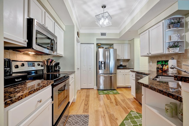 kitchen with visible vents, open shelves, white cabinetry, light wood finished floors, and appliances with stainless steel finishes