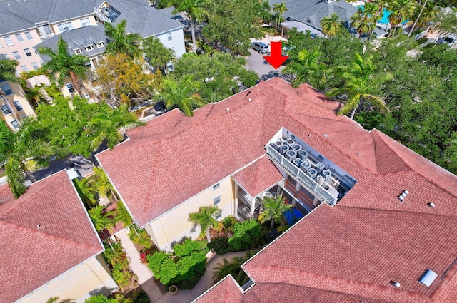 birds eye view of property with a residential view