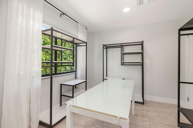 walk in closet with visible vents