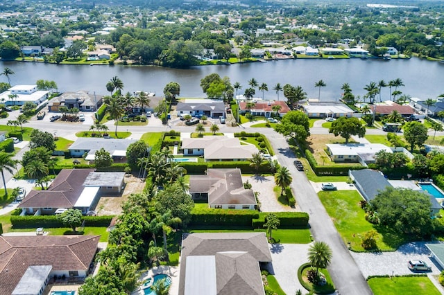 aerial view with a water view and a residential view