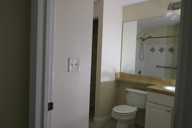 9825 Baywinds Dr Unit 1208, West Palm Beach, FL 33411 - full bathroom featuring toilet, vanity, a shower, and tile patterned flooring