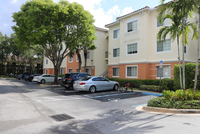 9825 Baywinds Dr Unit 1208, West Palm Beach, FL 33411 - view of property with uncovered parking