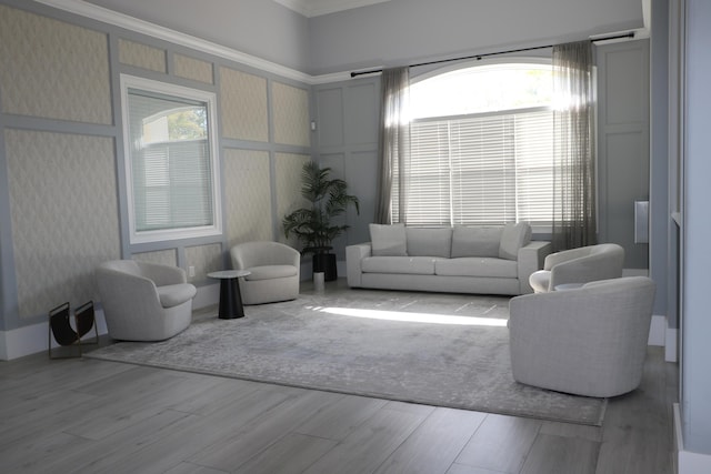 9825 Baywinds Dr Unit 1208, West Palm Beach, FL 33411 - living area featuring wood finished floors and ornamental molding