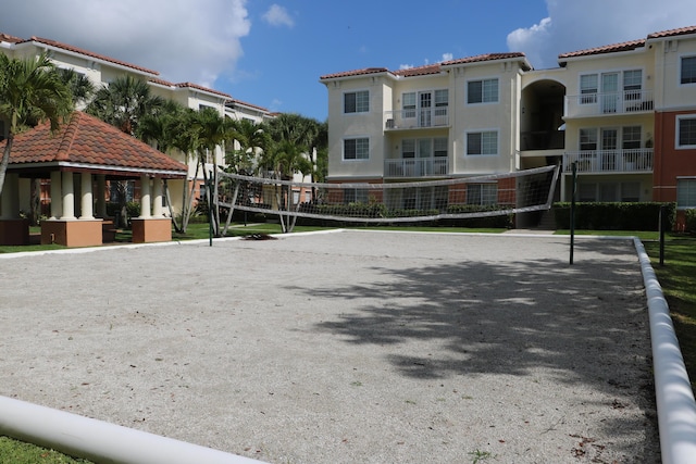 9825 Baywinds Dr Unit 1208, West Palm Beach, FL 33411 - surrounding community with volleyball court