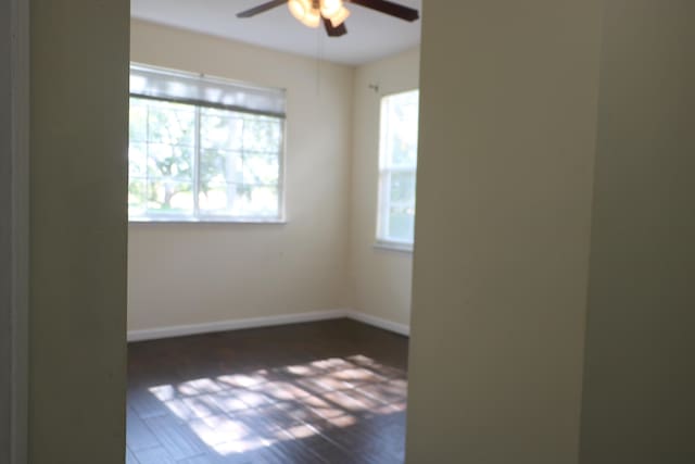 9825 Baywinds Dr Unit 1208, West Palm Beach, FL 33411 - unfurnished room with ceiling fan, baseboards, and wood finished floors