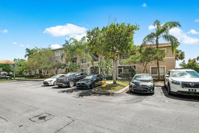 5031 Wiles Rd Unit 104, Coconut Creek, FL 33073 - exterior space featuring uncovered parking
