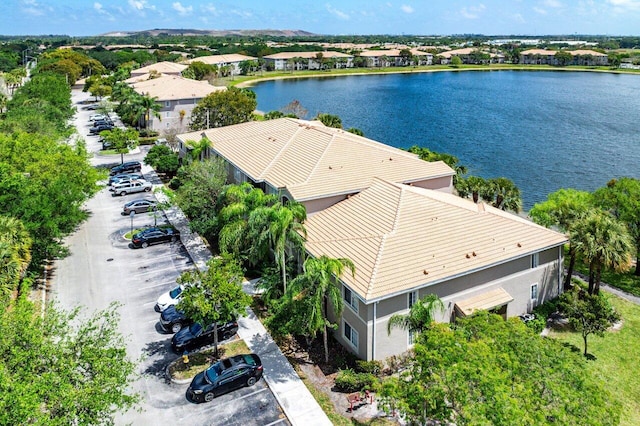 5031 Wiles Rd Unit 104, Coconut Creek, FL 33073 - drone / aerial view featuring a water view