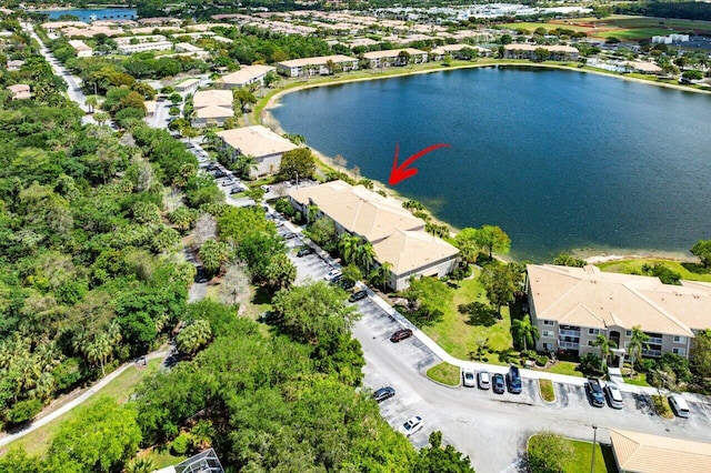 5031 Wiles Rd Unit 104, Coconut Creek, FL 33073 - bird's eye view with a water view
