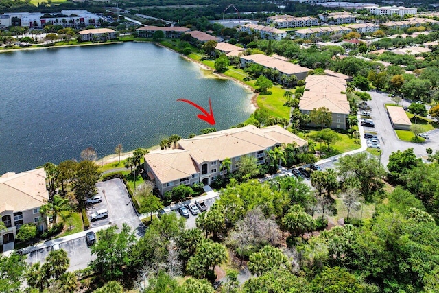 5031 Wiles Rd Unit 104, Coconut Creek, FL 33073 - bird's eye view with a water view