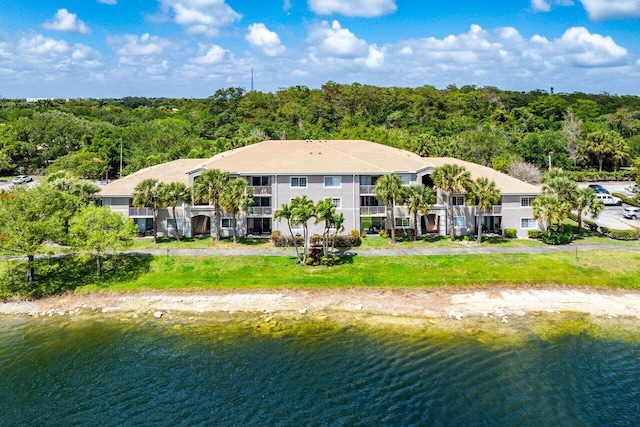 5031 Wiles Rd Unit 104, Coconut Creek, FL 33073 - birds eye view of property featuring a water view and a forest view