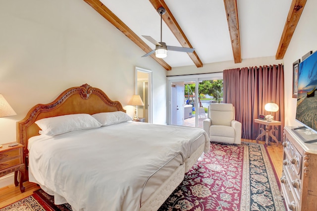 bedroom with access to outside, ceiling fan, wood finished floors, and vaulted ceiling with beams