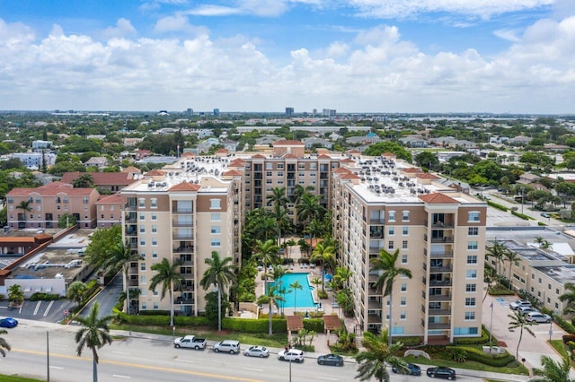 1801 N Flagler Dr Unit 828, West Palm Beach, FL 33407 - bird's eye view of a pool area and apartment complex / building
