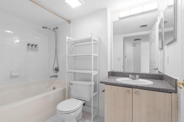 1801 N Flagler Dr Unit 828, West Palm Beach, FL 33407 - bathroom featuring toilet, tile patterned flooring,  shower combination, and vanity