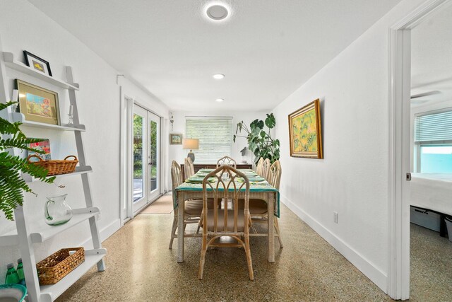 dining space with baseboards, recessed lighting, and a wealth of natural light