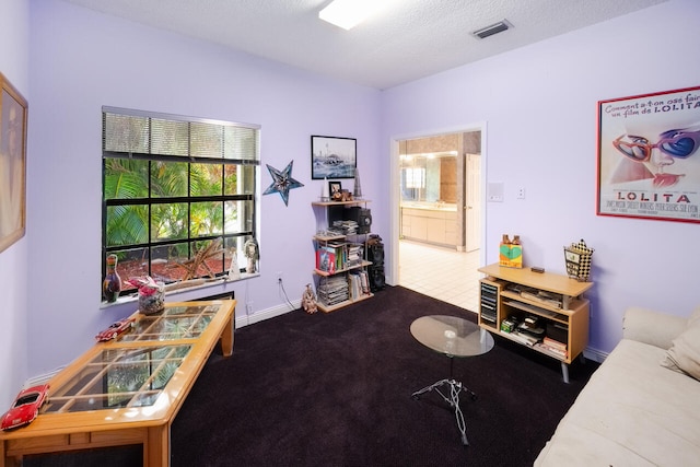 recreation room featuring visible vents, carpet, and baseboards