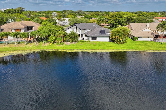 bird's eye view with a water view and a residential view