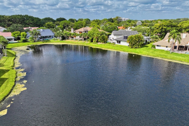 aerial view featuring a residential view and a water view