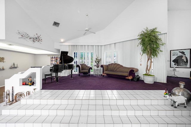 interior space featuring visible vents, carpet flooring, ceiling fan, and high vaulted ceiling