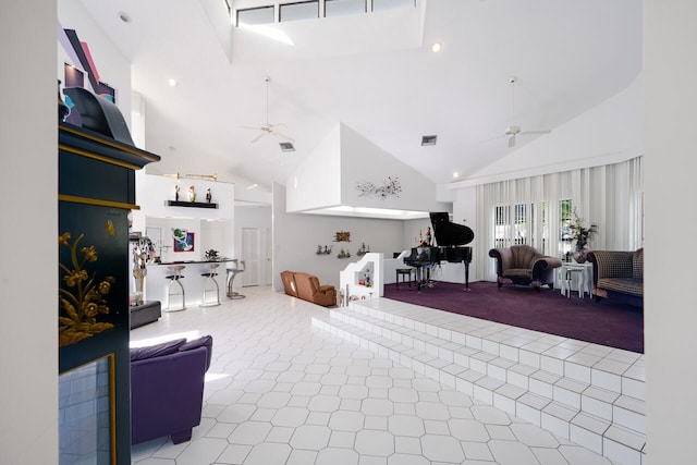interior space with high vaulted ceiling, ceiling fan, recessed lighting, and visible vents