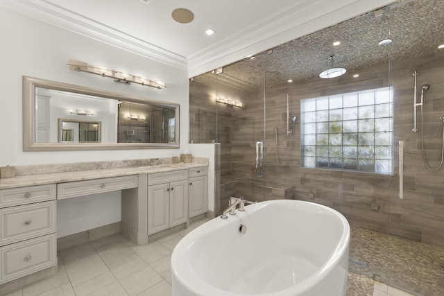 103 River Dr, Tequesta, FL 33469 - full bathroom featuring a stall shower, vanity, a freestanding tub, tile patterned floors, and crown molding