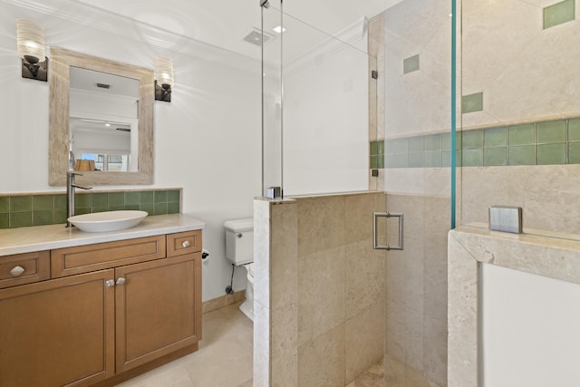 103 River Dr, Tequesta, FL 33469 - bathroom featuring a stall shower, vanity, crown molding, tasteful backsplash, and toilet
