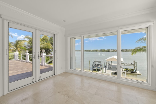 103 River Dr, Tequesta, FL 33469 - unfurnished sunroom featuring a water view