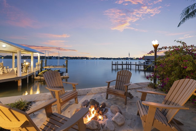 103 River Dr, Tequesta, FL 33469 - dock area with a fire pit and a water view