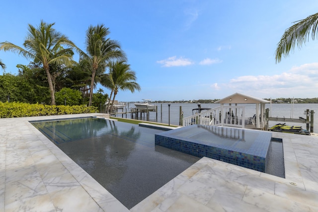103 River Dr, Tequesta, FL 33469 - view of pool featuring a dock, boat lift, a water view, and a patio