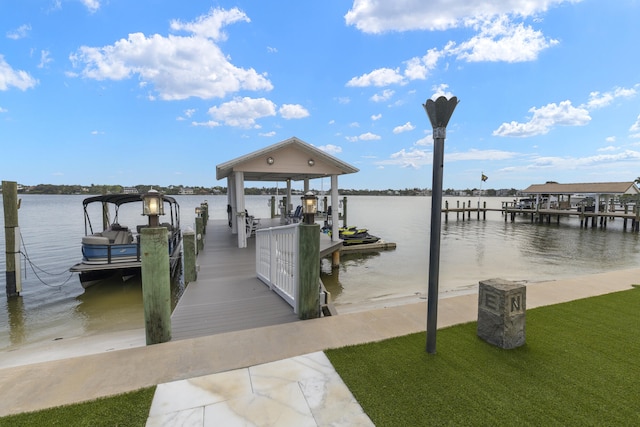 103 River Dr, Tequesta, FL 33469 - dock area with boat lift and a water view