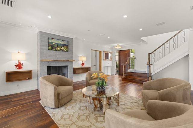 103 River Dr, Tequesta, FL 33469 - living area featuring hardwood / wood-style flooring, ornamental molding, stairway, recessed lighting, and baseboards