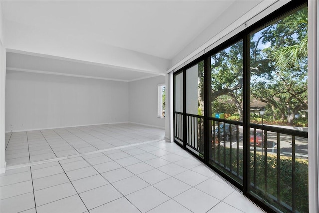 1640 Twelve Oaks Way Unit 205, North Palm Beach, FL 33408 - unfurnished room with baseboards and light tile patterned floors