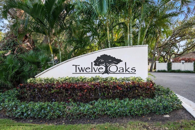 1640 Twelve Oaks Way Unit 205, North Palm Beach, FL 33408 - community sign with fence