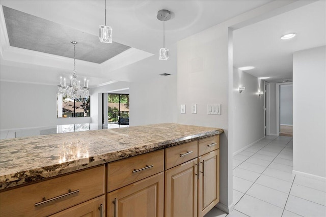 1640 Twelve Oaks Way Unit 205, North Palm Beach, FL 33408 - kitchen with light stone countertops, a notable chandelier, decorative light fixtures, baseboards, and light tile patterned floors