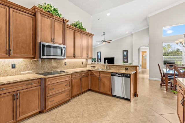 8837 Woodgrove Ridge Ct, Boynton Beach, FL 33473 - bedroom featuring visible vents, crown molding, light wood-style floors, a raised ceiling, and arched walkways