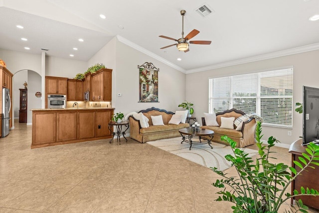 8837 Woodgrove Ridge Ct, Boynton Beach, FL 33473 - living room featuring arched walkways, ceiling fan, recessed lighting, and ornamental molding